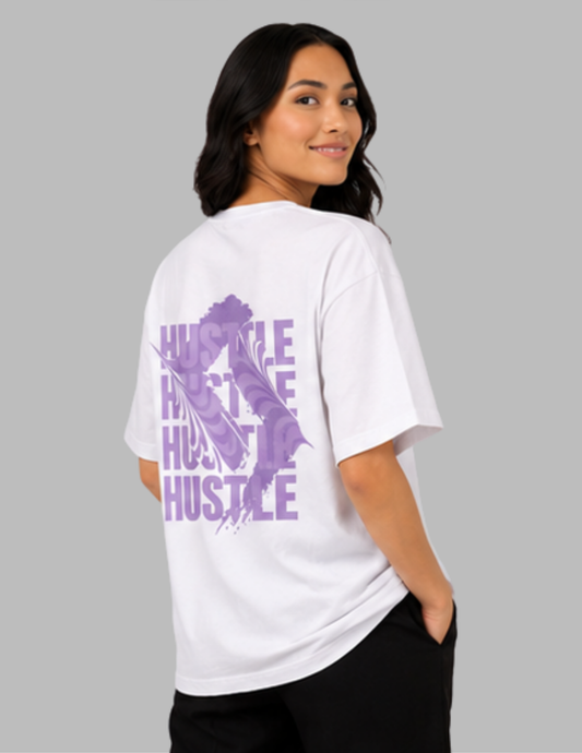 Person wearing a white t-shirt with purple graphic and text on a gray background