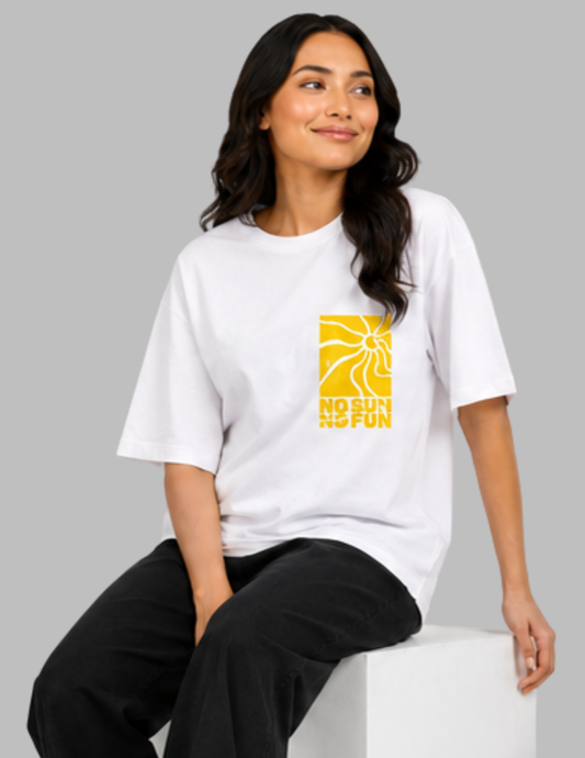 Woman wearing a white t-shirt with a yellow graphic design on a gray background