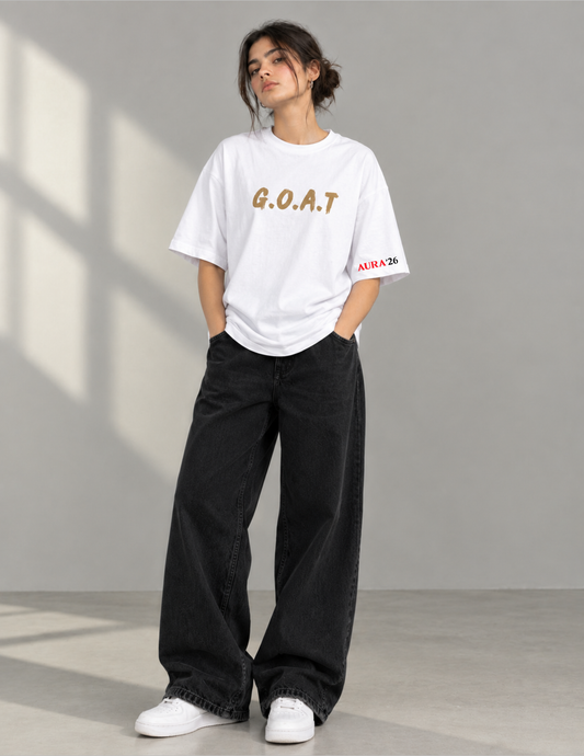 A woman modeling a white oversized t-shirt with 'G.O.