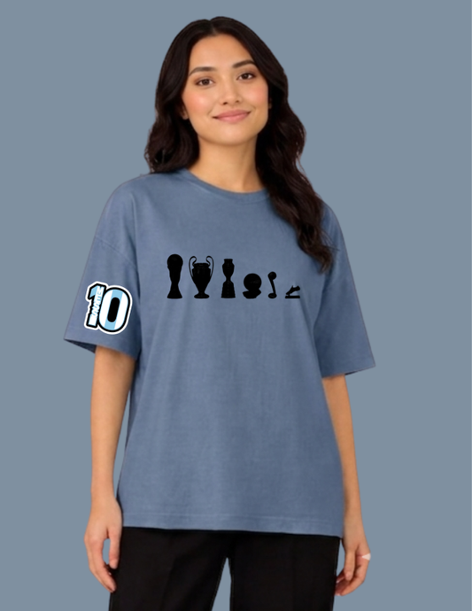 Person wearing a blue t-shirt with graphic designs and number '10' on a plain background