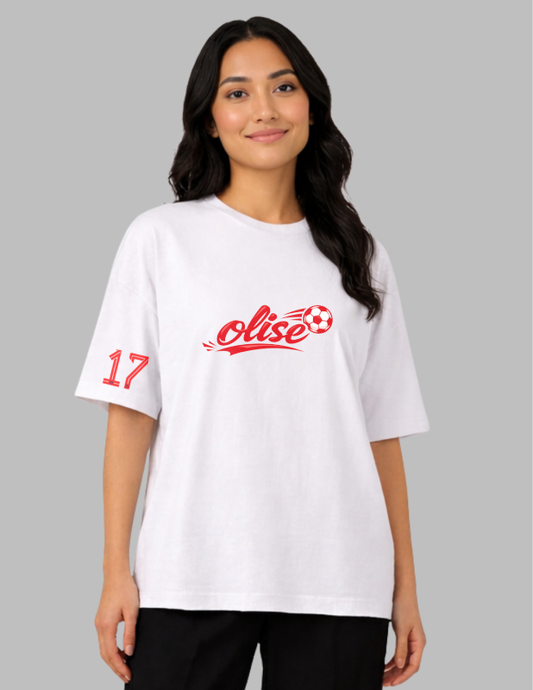 Person wearing a white t-shirt with red and black text on a gray background