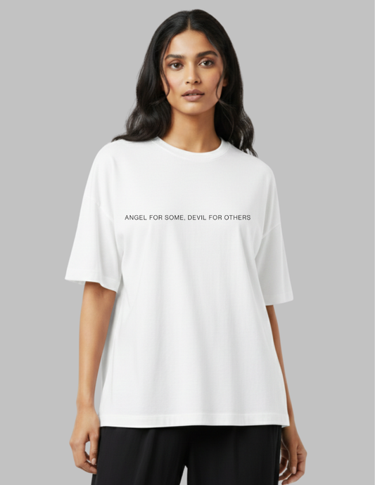 Woman wearing a white t-shirt against a gray background