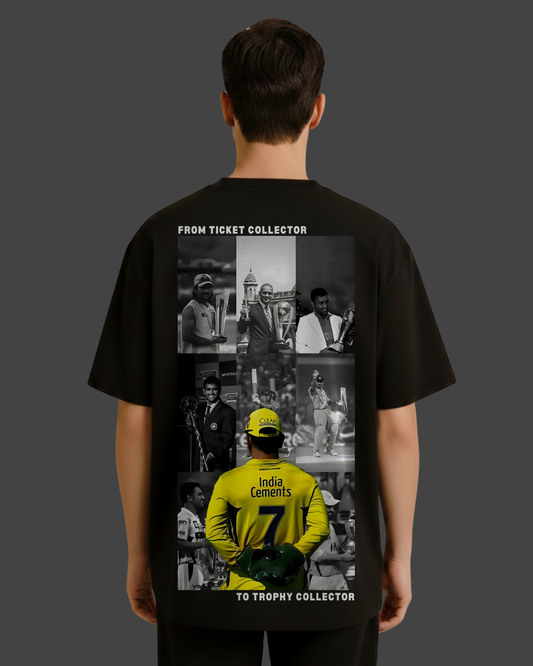 Black t-shirt with a collage of images and text on the back, worn by a person.