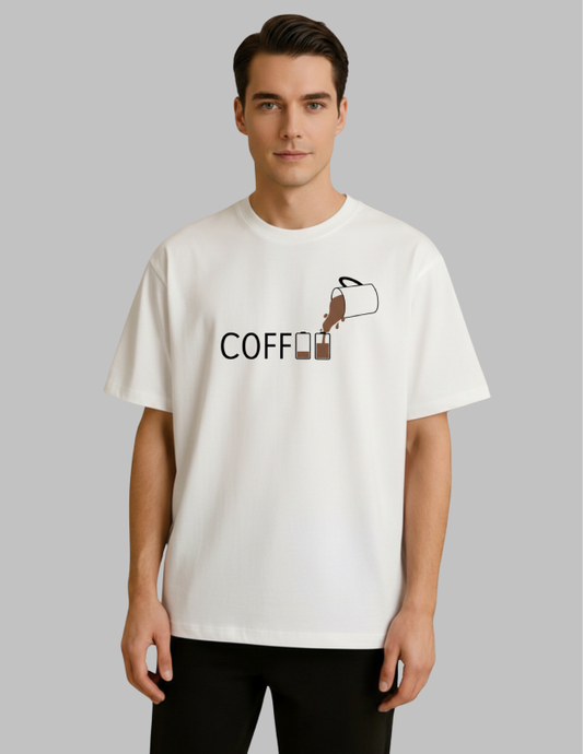 Man wearing a white t-shirt with a coffee-themed graphic design on a gray background