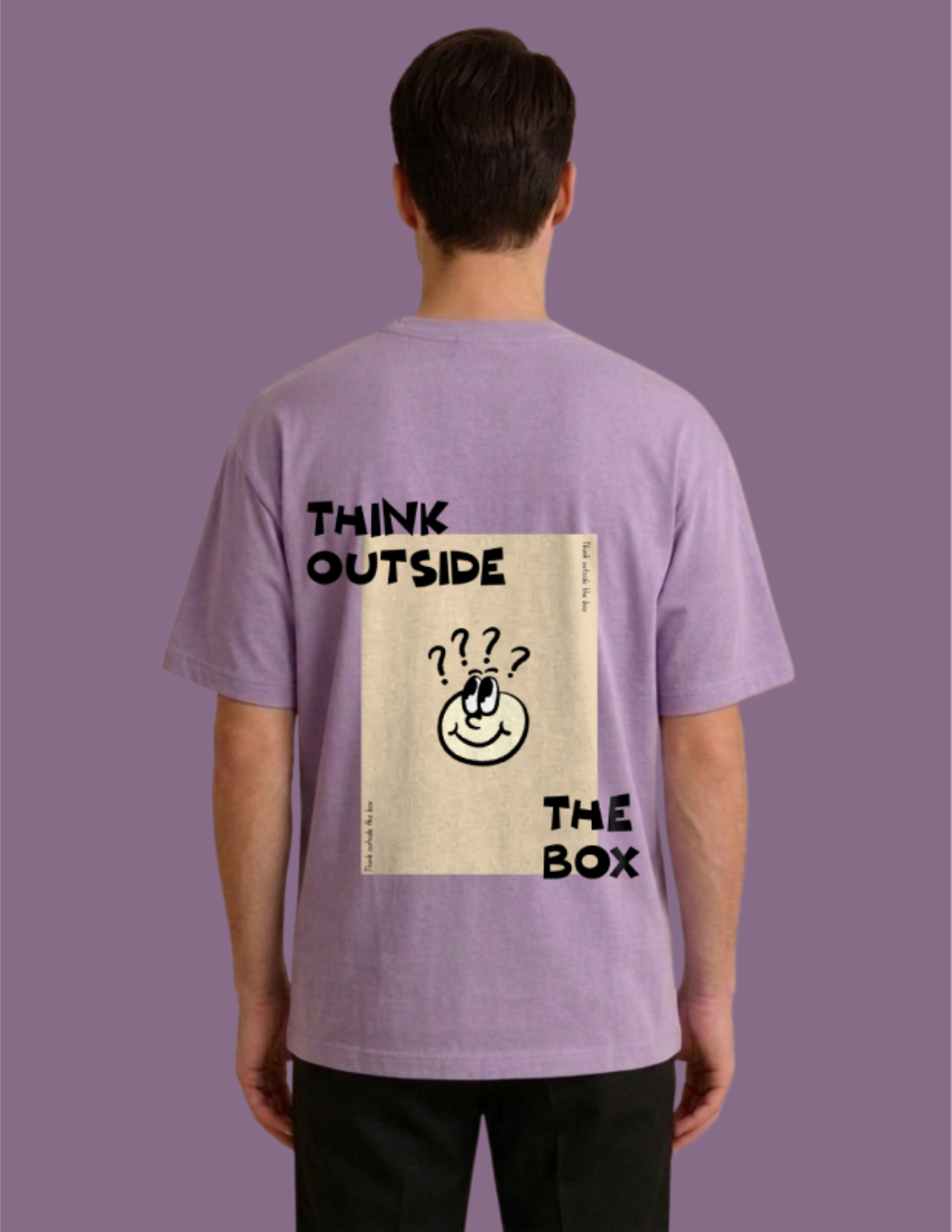 Person wearing a purple t-shirt with 'Think Outside The Box' design on a purple background