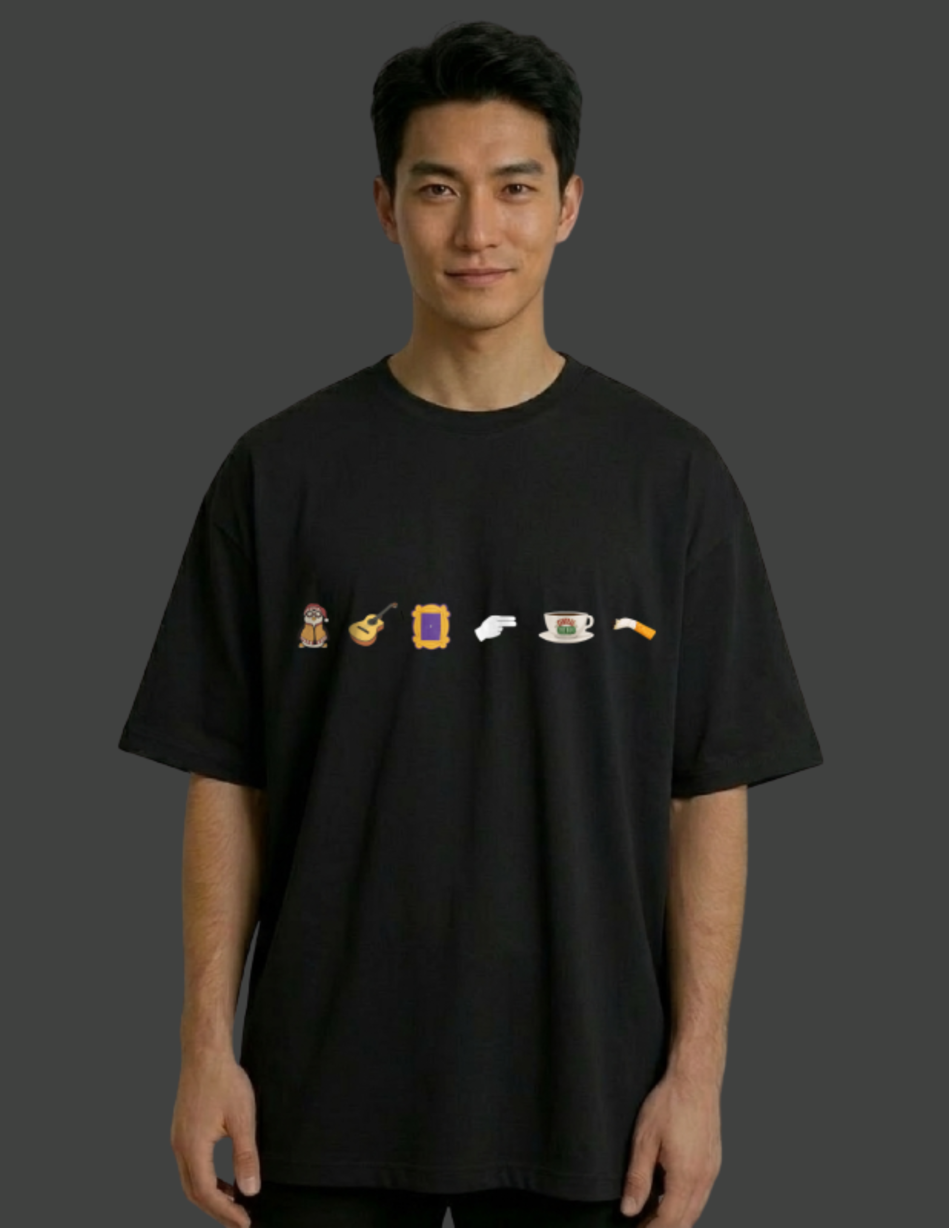 Person wearing a black t-shirt with small graphic designs on a dark background