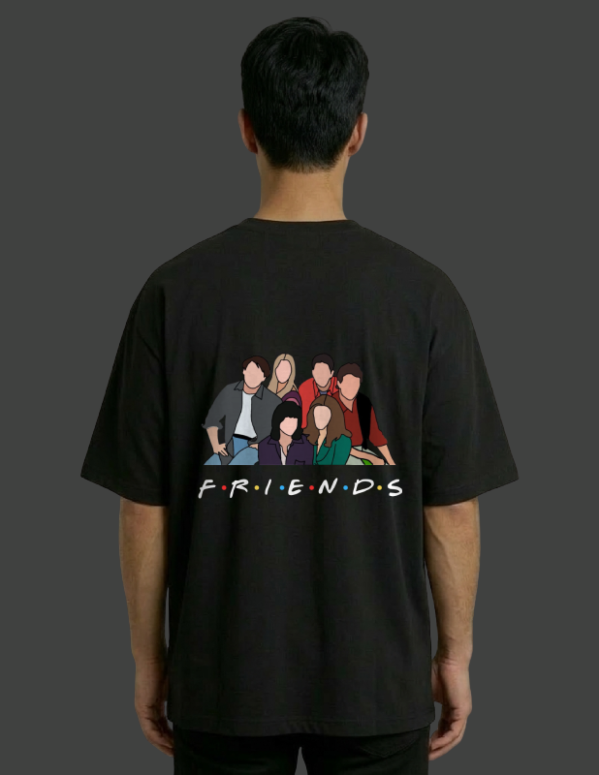 Person wearing a black 'Friends' t-shirt with character graphic on the back