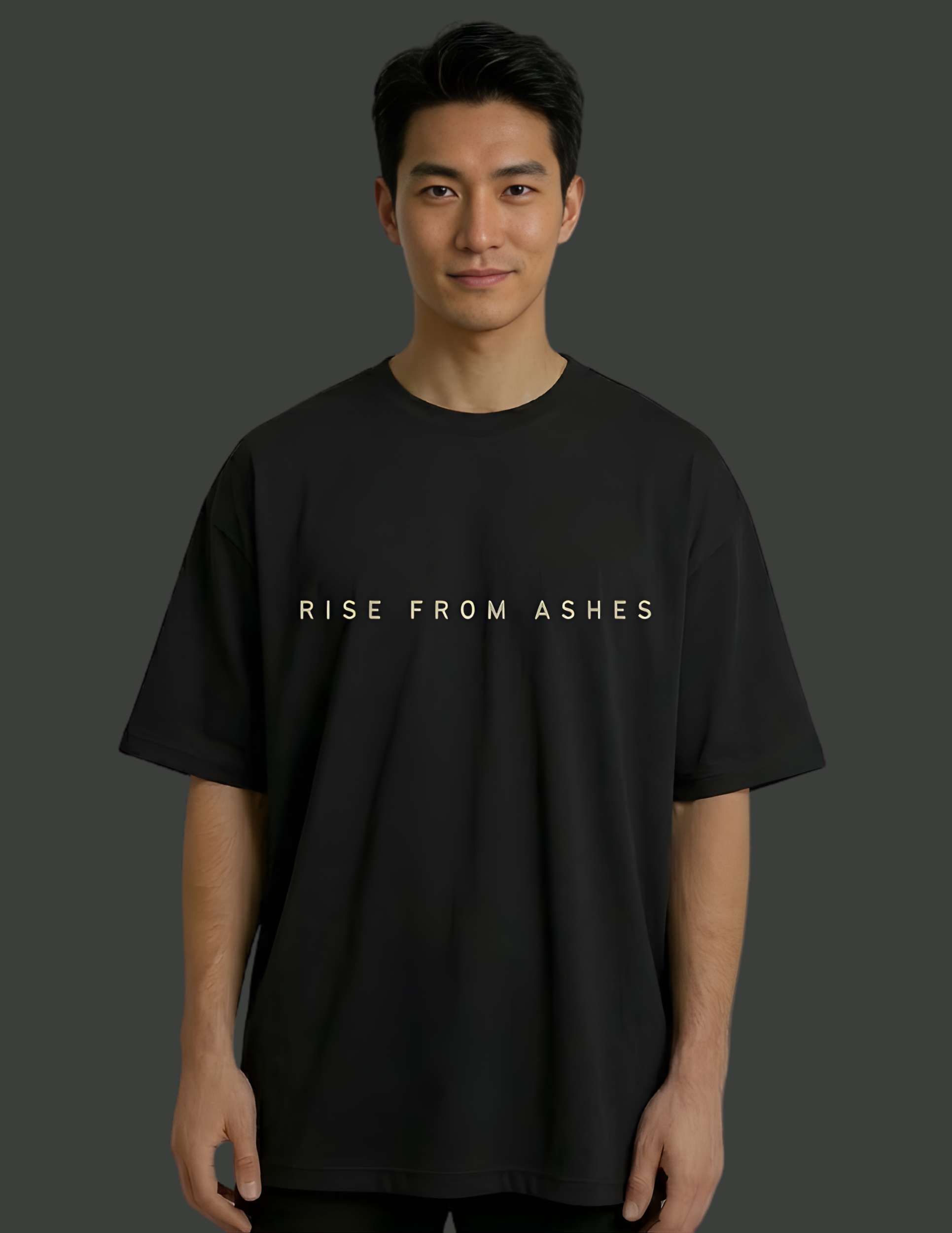 Person wearing a black t-shirt with 'RISE FROM ASHES' text on a dark background