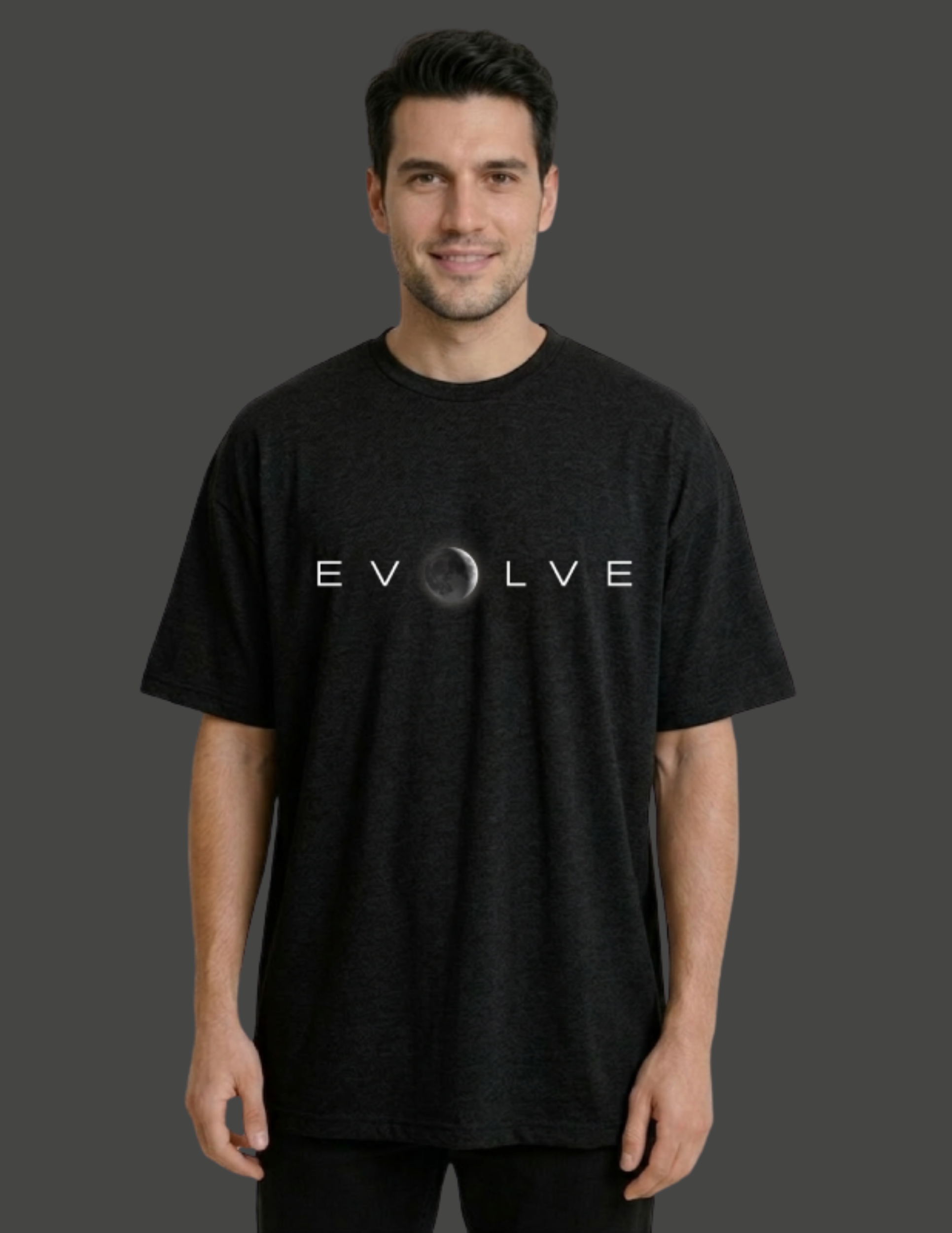 Man wearing a black t-shirt with 'EVOLVE' logo on a dark background