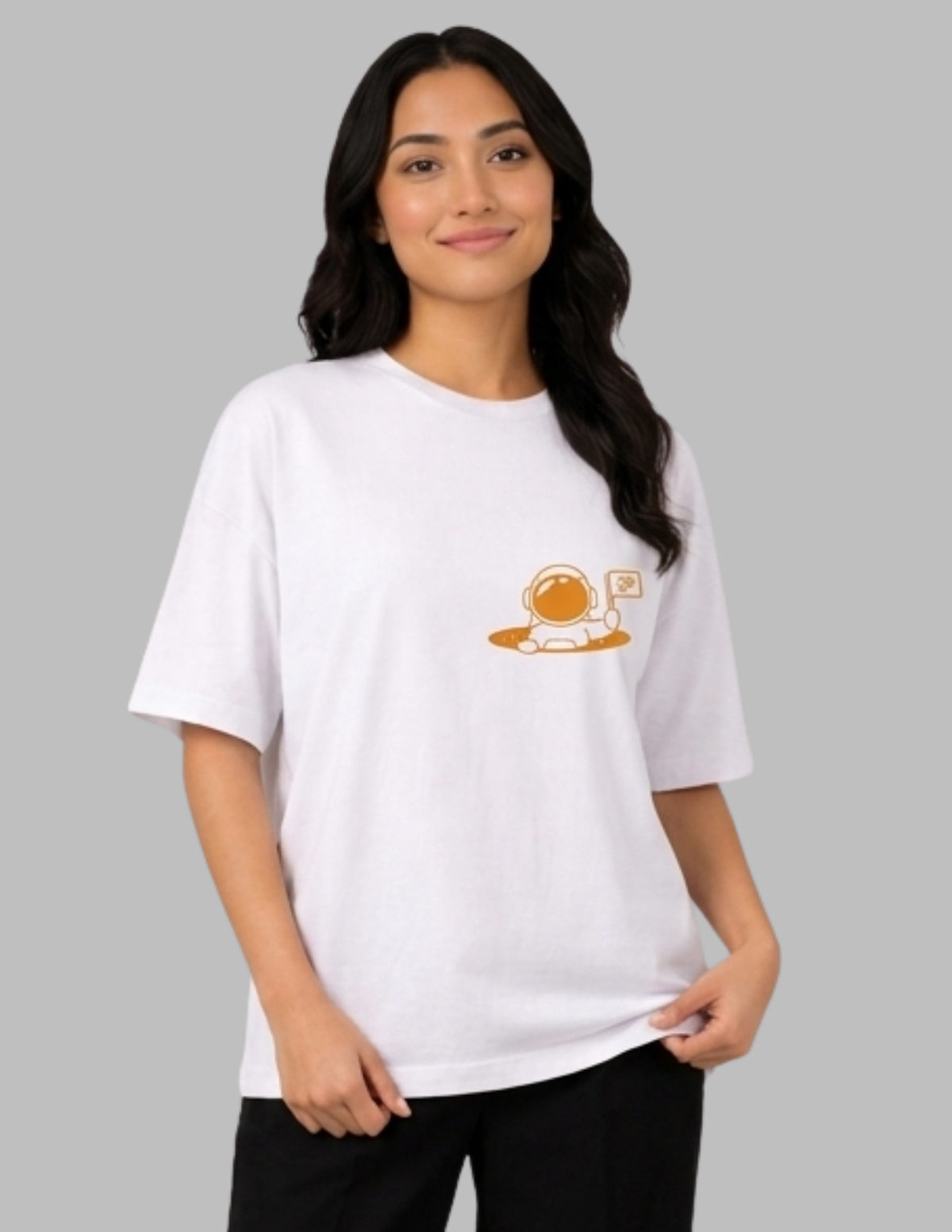 Person wearing a white t-shirt with a logo on a gray background