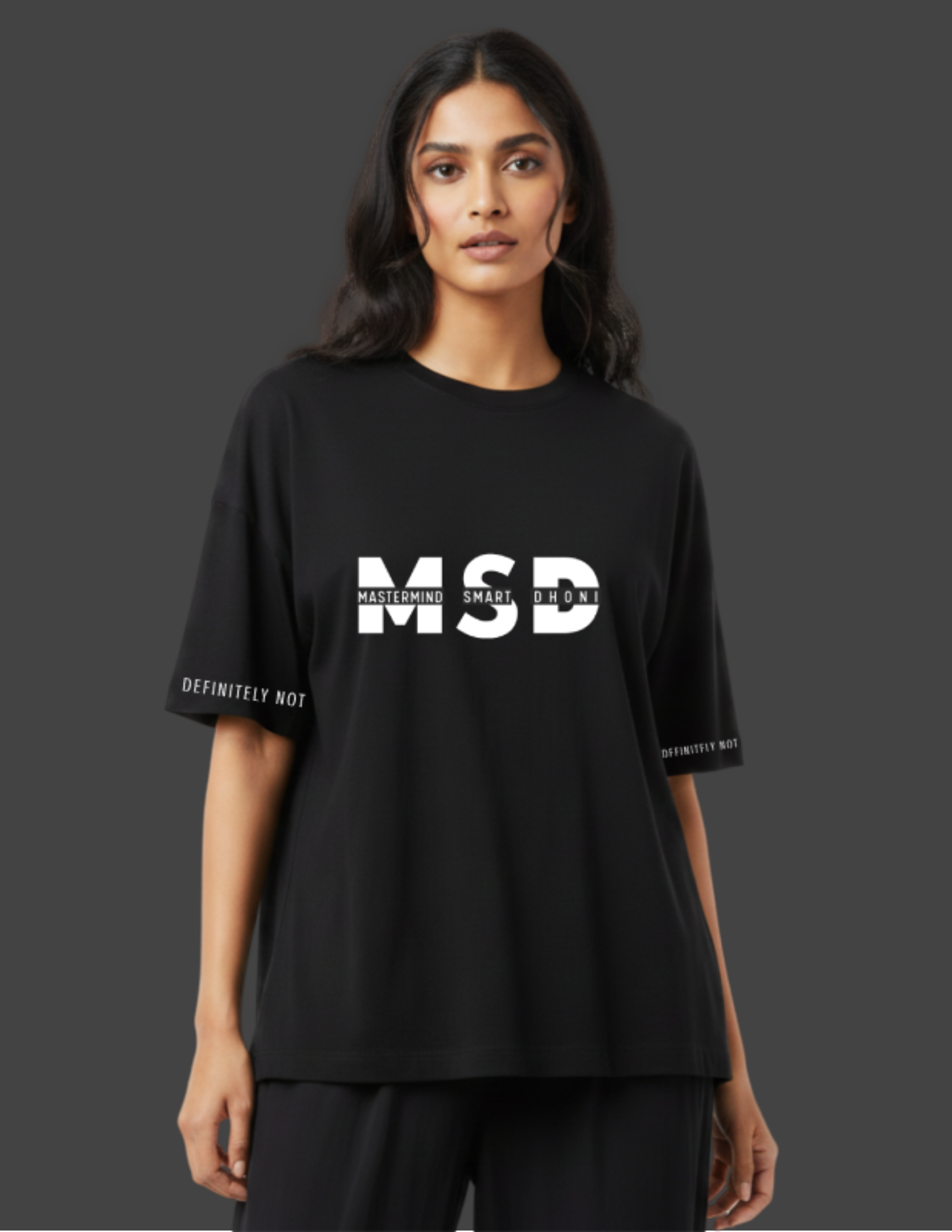 Person wearing a black t-shirt with 'MSD' printed on it against a dark background
