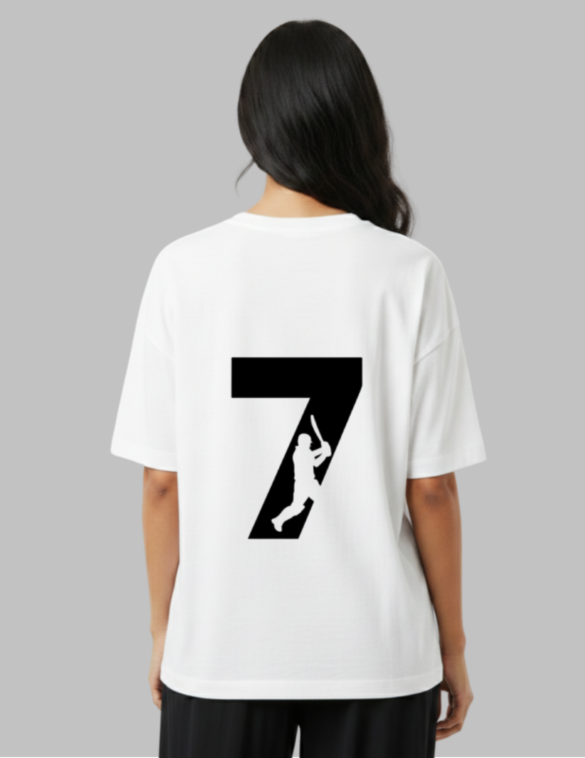 Person wearing a white t-shirt with a black number 7 and silhouette design on the back, against a gray background.