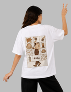 A woman shown from the back wearing an oversized white t-shirt with a large square graphic print on the back. The graphic features a grid of coffee-themed illustrations in brown and beige tones, including a coffee cup, a hat, and the word 'coffee'.