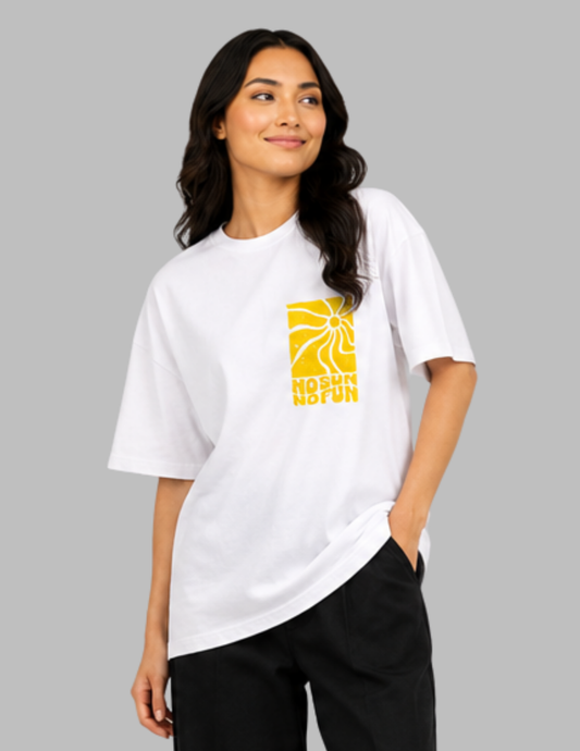 Woman wearing a white t-shirt with a yellow graphic design on a gray background