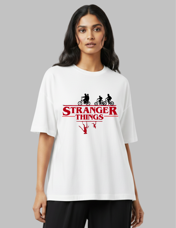 Woman wearing a white t-shirt with 'Stranger Things' logo on a gray background
