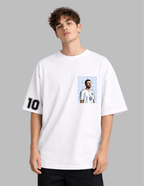 Person wearing a white t-shirt with a graphic design on a gray background