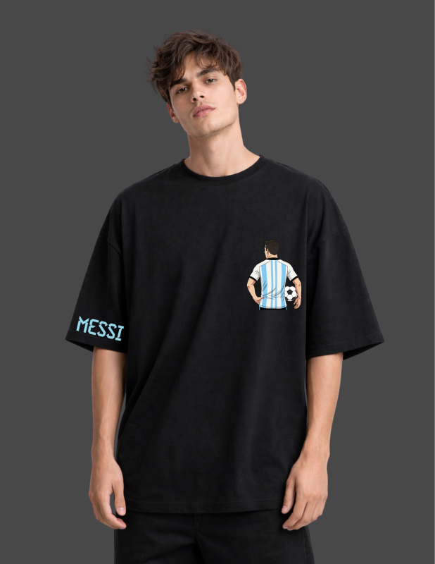 Person wearing a black t-shirt with a graphic design and 'MESSI' text on a dark background