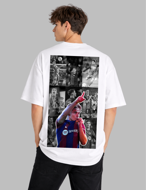 Person wearing a white t-shirt with a collage of images on the back, standing against a gray background.