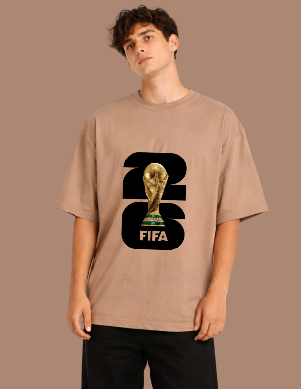 Person wearing a brown t-shirt with FIFA World Cup trophy graphic on a beige background
