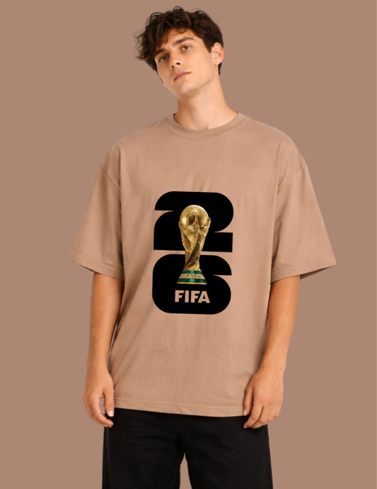 Person wearing a brown t-shirt with FIFA World Cup trophy graphic on a beige background