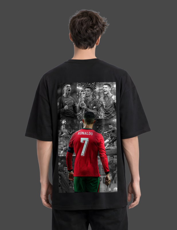 Person wearing a black t-shirt with a graphic of a soccer player in a red jersey on the back.