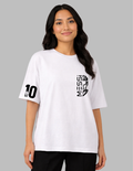 Woman wearing a white t-shirt with black graphics and text on a gray background