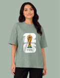 Person wearing a green t-shirt with FIFA World Cup 2023 logo on a gray background