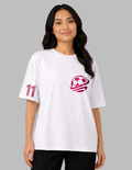 Woman wearing a white t-shirt with a red logo and number 11 on a gray background