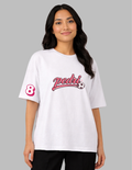 Person wearing a white 'Harry Potter' t-shirt on a gray background