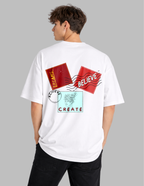 Person wearing a white t-shirt with graphic designs and text on a gray background