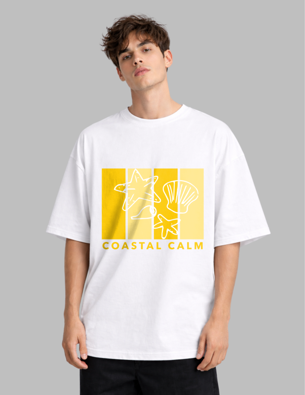 Person wearing a white t-shirt with yellow graphic design and 'Coastal Calm' text on a gray background