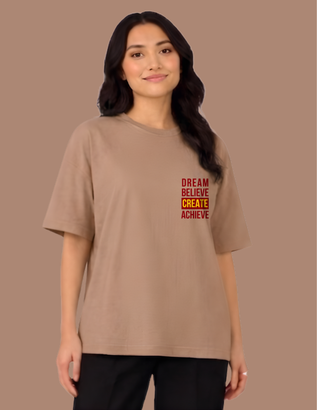 Woman wearing a brown t-shirt with motivational text on a brown background