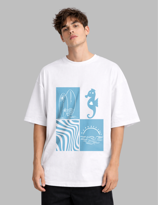 Person wearing a white t-shirt with blue graphics on a gray background
