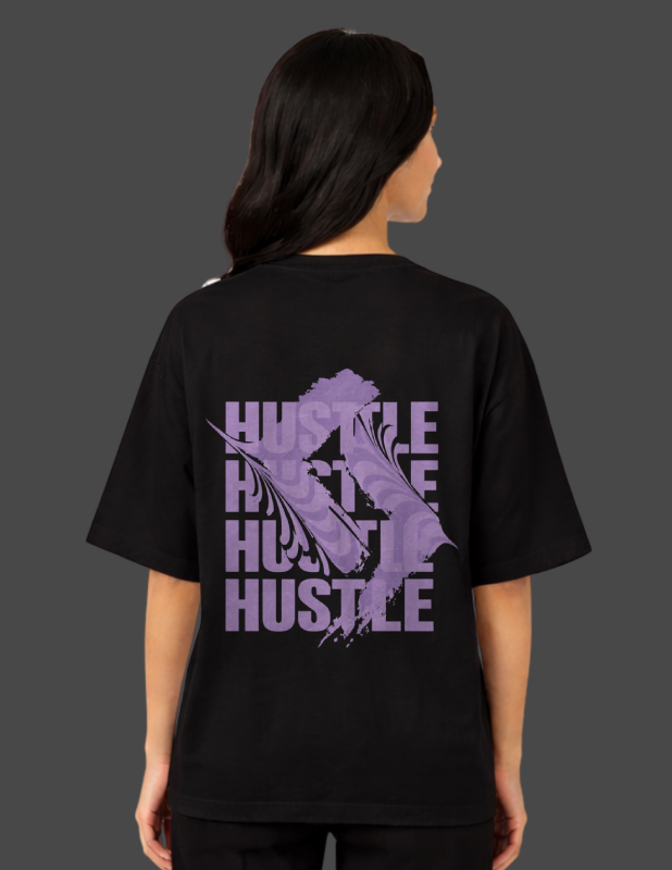 Person wearing a black t-shirt with purple graphic and 'Hustle' text on the back.