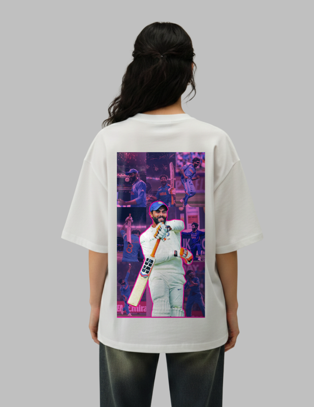 Person wearing a white t-shirt with a colorful graphic on the back, standing against a plain background