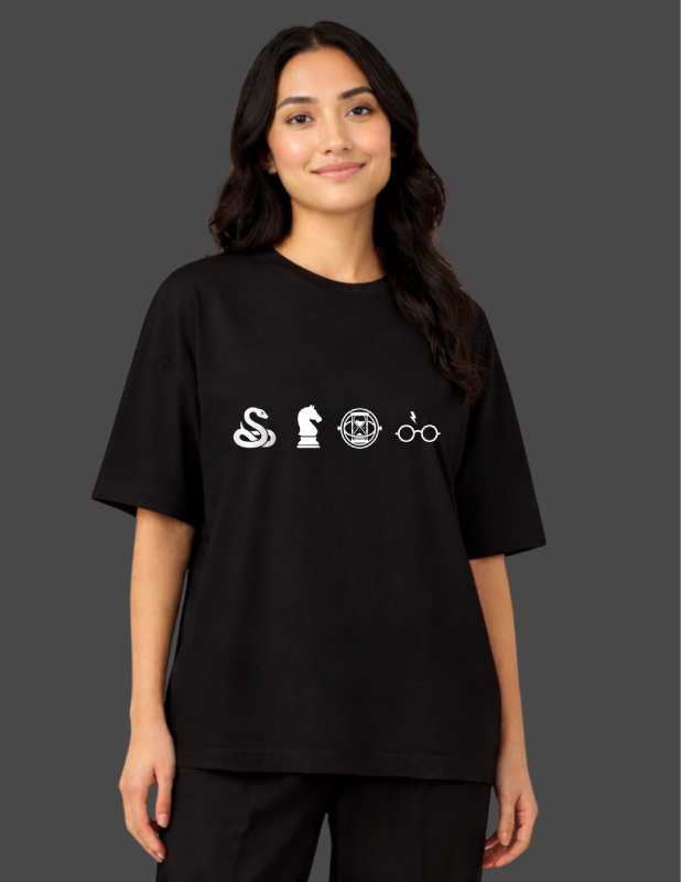 Person wearing a black t-shirt with white symbols on a dark background