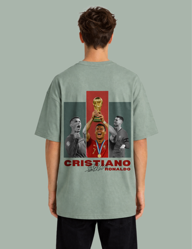 Person wearing a t-shirt with a graphic of Cristiano Ronaldo holding a trophy and text on a gray background