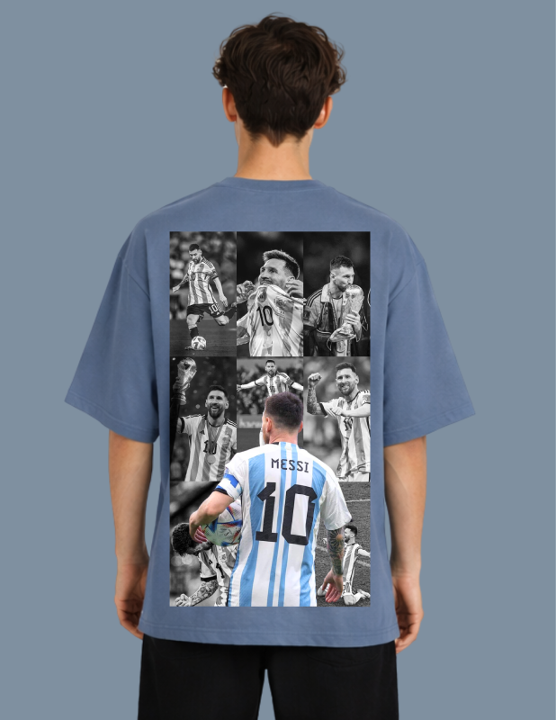 Person wearing a blue t-shirt with a collage of soccer player images on the back, set against a gray background.