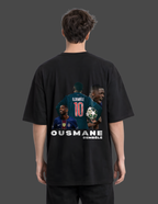 Person wearing a black t-shirt with a graphic of a soccer player and text on the back.