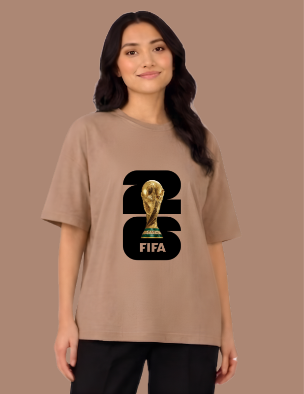 Woman wearing a beige t-shirt with FIFA World Cup trophy graphic on a brown background