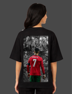 Person wearing a black t-shirt with a collage of images on the back, including a soccer player in a red jersey.