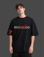 Person wearing a black t-shirt with 'RONALDO' and number '7' on a dark background