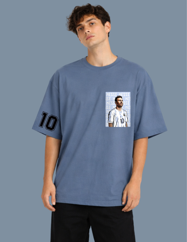 Person wearing a blue t-shirt with a graphic design on a gray background