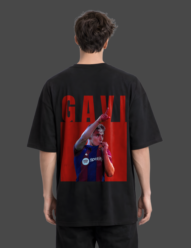 Person wearing a black t-shirt with a graphic of a person in a sports jersey and the word 'Gavi' on the back.