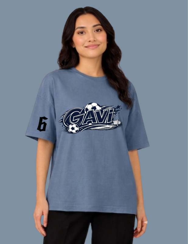 Person wearing a blue t-shirt with 'Gavi' logo on a plain background