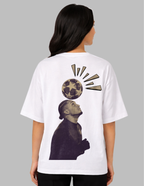 Person wearing a white t-shirt with a graphic design on the back, featuring a soccer ball and a person's head.