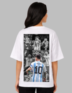 Person wearing a white t-shirt with a collage of images on the back, set against a gray background.