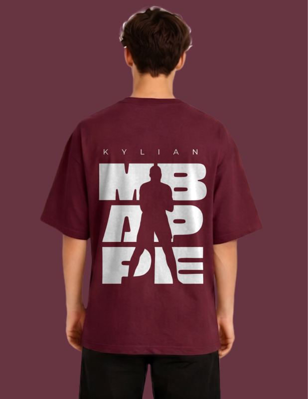 Person wearing a maroon t-shirt with white text and silhouette on the back against a dark red background