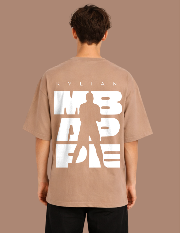 Person wearing a brown t-shirt with a white graphic and text on the back against a brown background