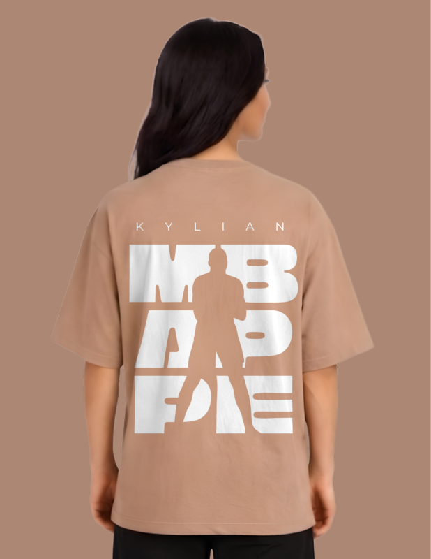 Person wearing a brown t-shirt with white text and silhouette on a brown background